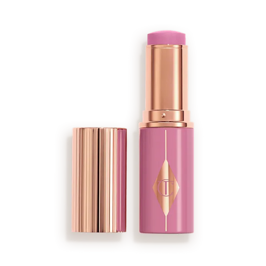CHARLOTTE TILBURY UNREAL LIP + CHEEK GLOW BLUSH STICK WITH HYALURONIC ACID