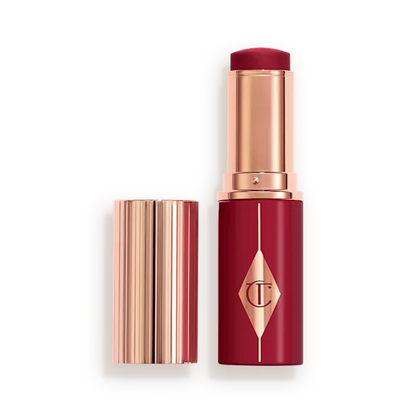 CHARLOTTE TILBURY UNREAL LIP + CHEEK GLOW BLUSH STICK WITH HYALURONIC ACID